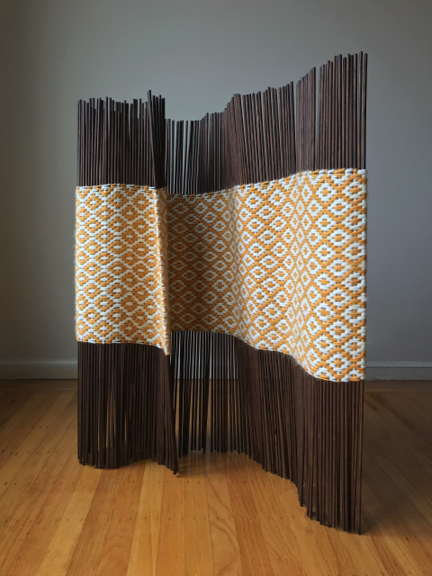 Untitled, 2018. Wooden Dowels and wool yarn. 36 × 56 inches.