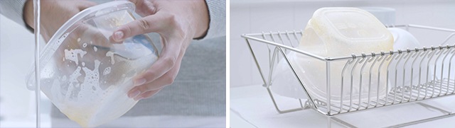 Hand washing stained plasticware with soapy sponge under faucet and plasticware drying in dish rack