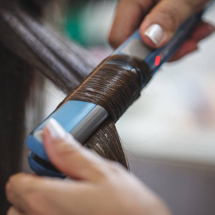 How to Curl Hair with a Flat Iron: 3 Ways - IPSY