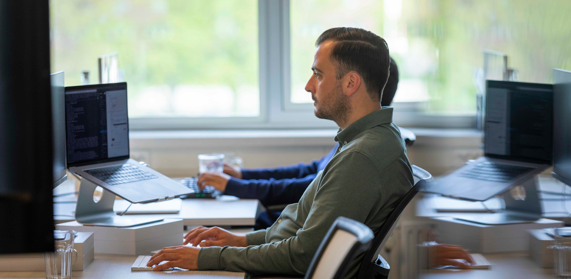 Enkele developers druk aan het werk