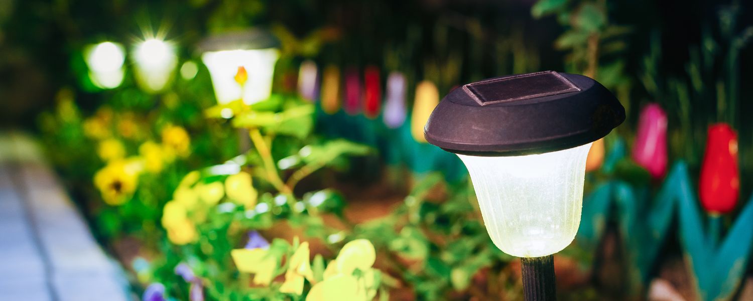 A garden light among the plants and greenery