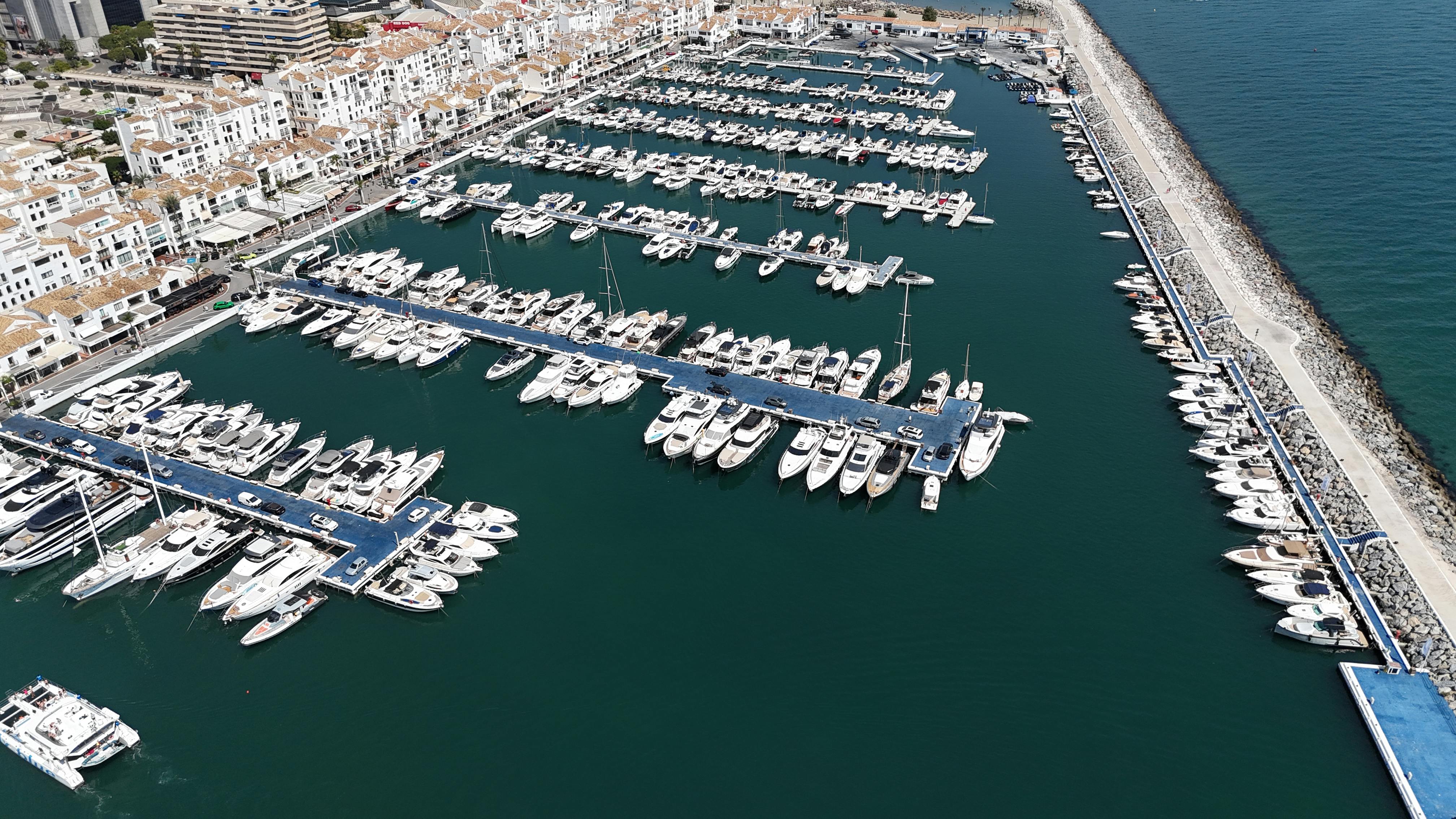 Luxury yachts docked at Puerto Banús marina in Marbella, Spain – a prime location for web design clients