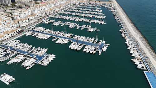 Luxury yachts docked at Puerto Banús marina in Marbella, Spain – a prime location for web design clients