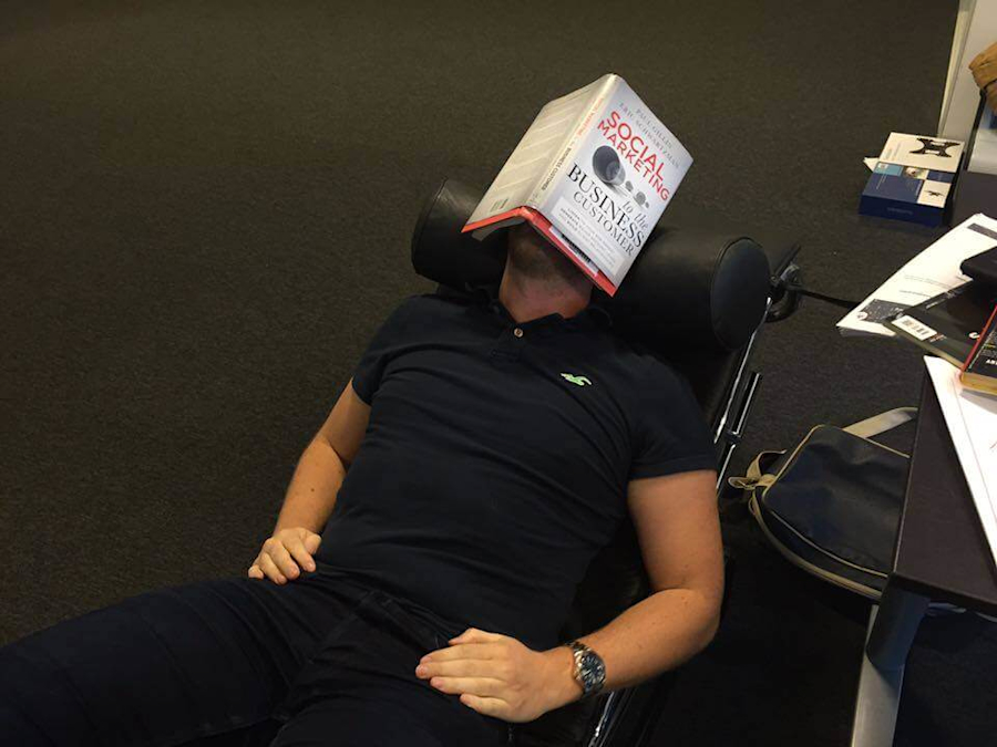 facepalm with a book