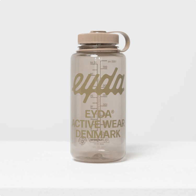 A translucent beige EYDA water bottle