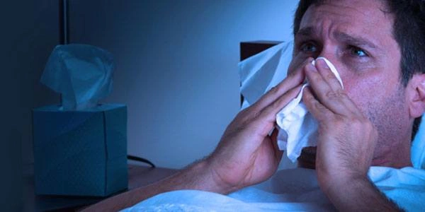 Cómo reducir la fiebre asociada con un resfriado o gripe