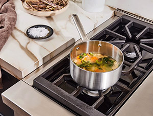 Mini Sauce Pan - Stainless Steel - Lifestyle on Stovetop gif