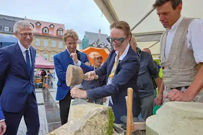 DSD-Vorstand Juliane Parys, Steffen Skudelny und Bambergs OB Sebastian M. Niedermaier auf dem Markt der Möglichkeiten | Fotoquelle: DSD/Roland Rossner