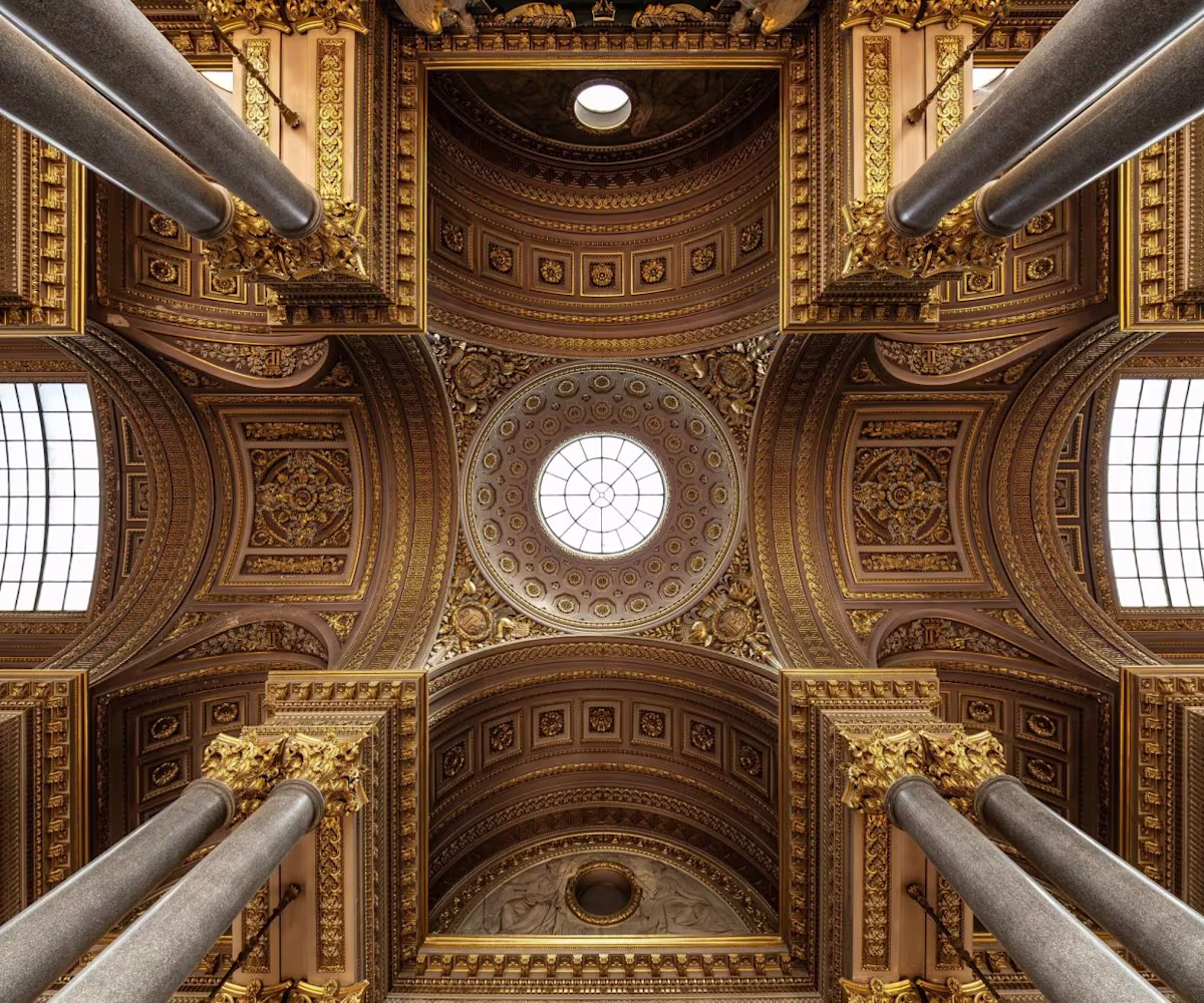 The Sense of Baroque: When The Royal Trumpets Sound ornate ceiling of the palace of versailles from below, with a round stained glass window in the centre