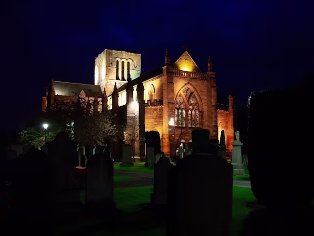Monteverdi Vespers of 1610 st marys church haddington scotland in the dark illuminated by spotlights from the graveyard