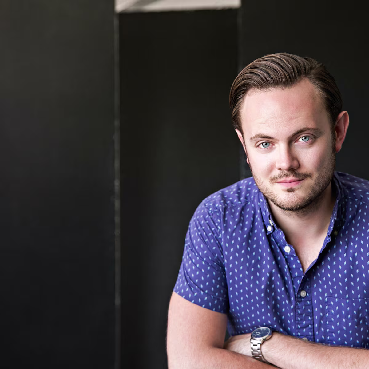 Nick Pritchard’s Summer Concert Picks nick pritchard tenor headshot in blue shirt by nick hames