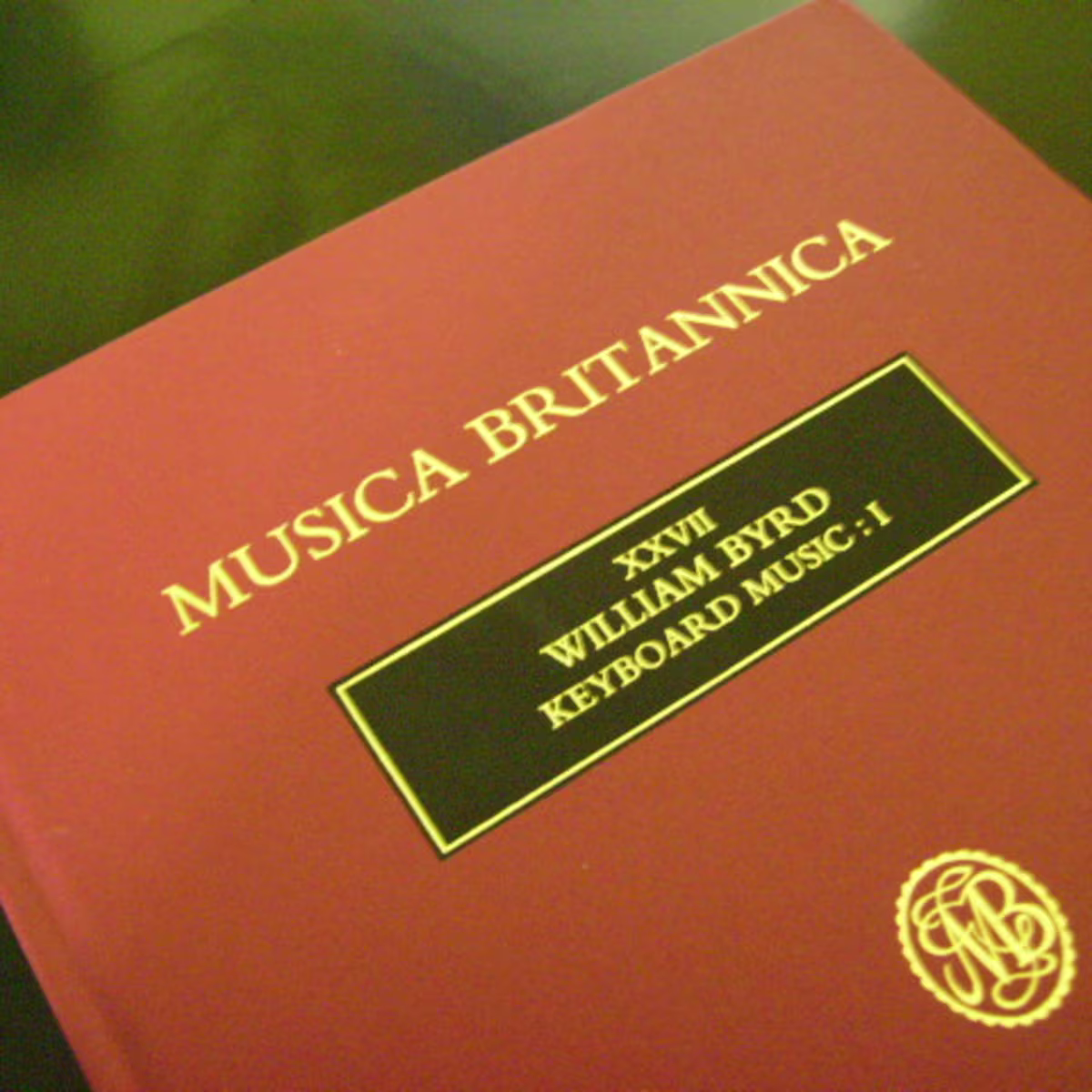 Young keyboard players invited to apply for Musica Britannica Trust competition a hardback volume of keyboard music with a red colour and gold writing