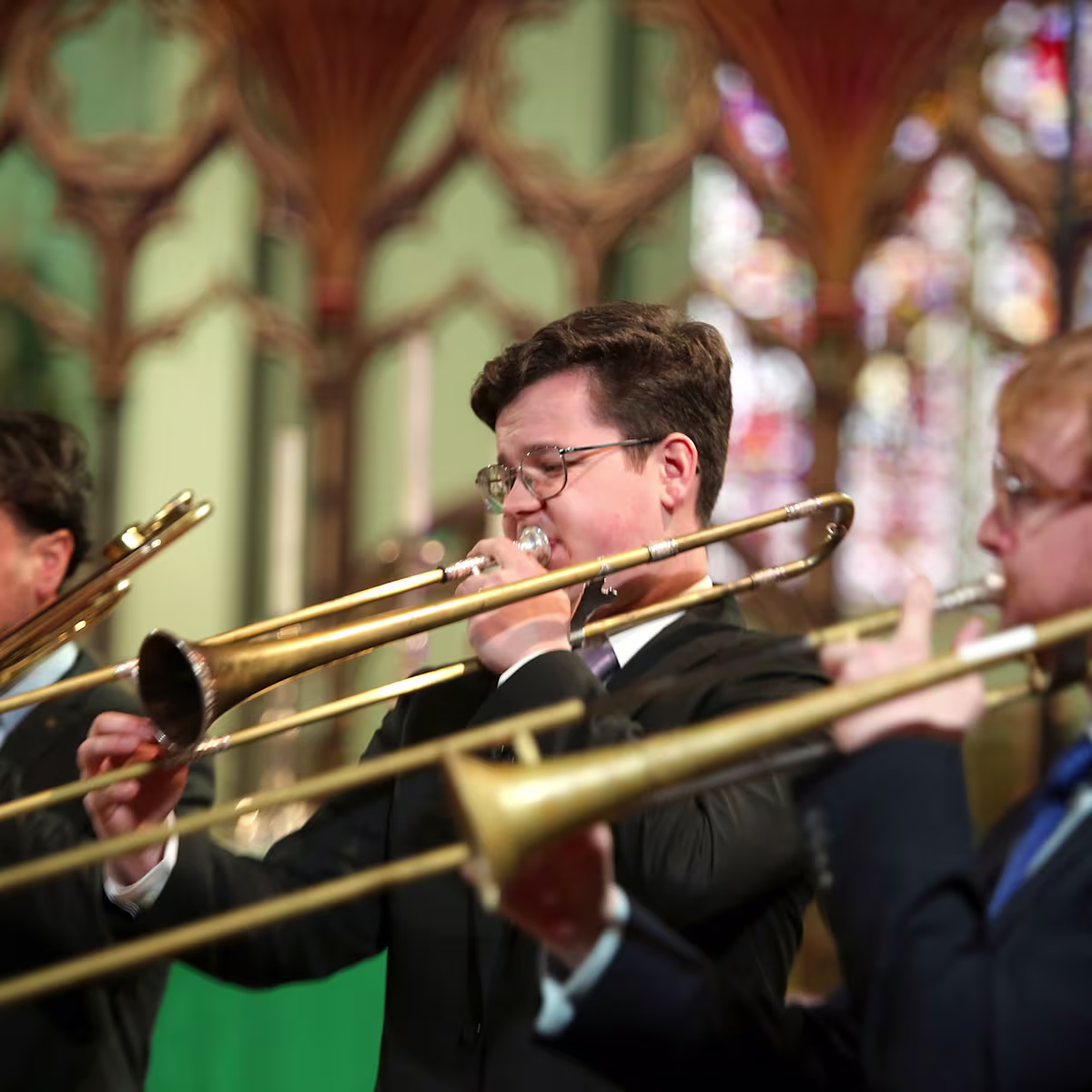 Brighton Early Music Festival launches 2026 Emerging Artists scheme three baroque sackbut players blowing down their instruments