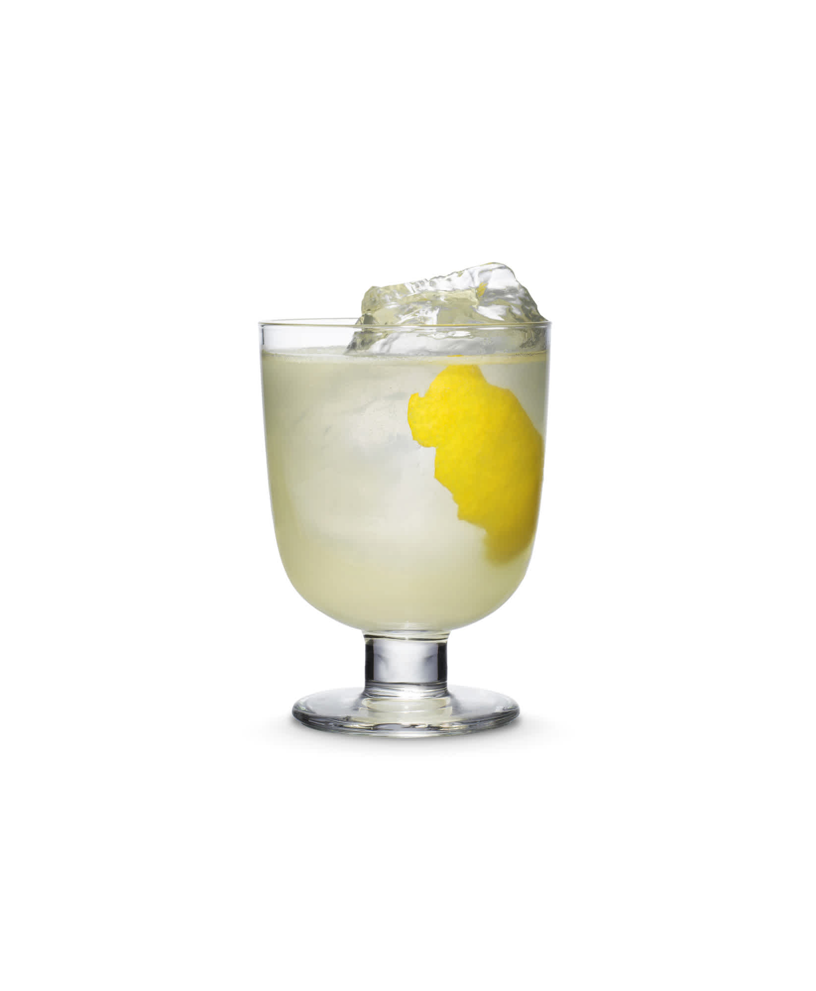 Tom Collins cocktail garnished with lemon peel