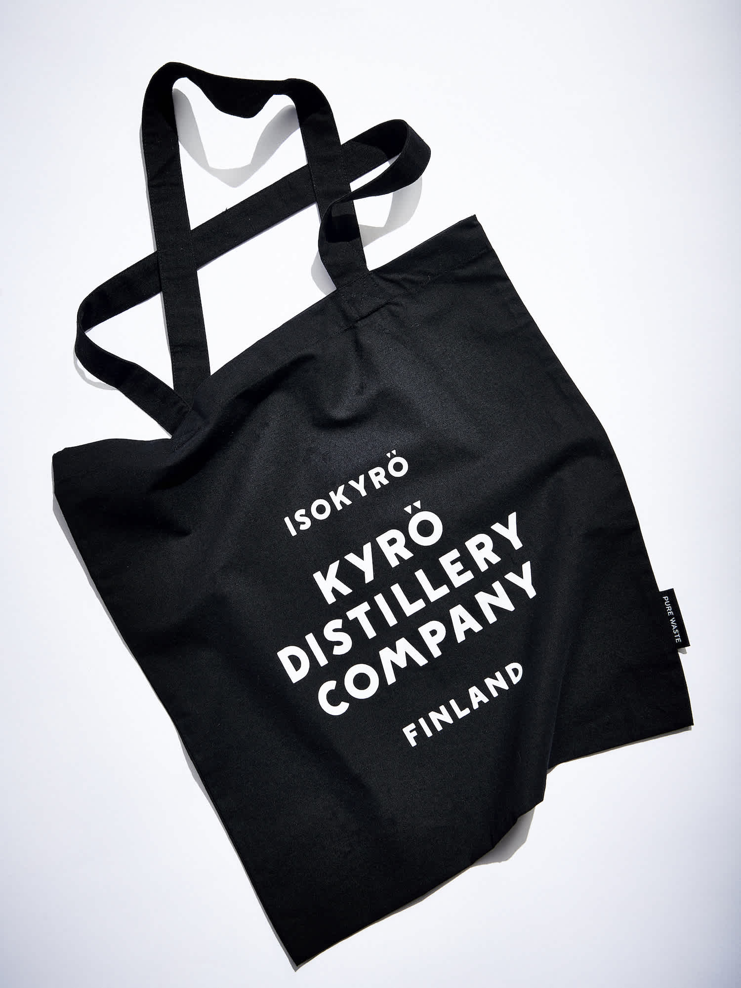 Product photo: black Kyrö Distillery tote bag with white Kyrö logo. 