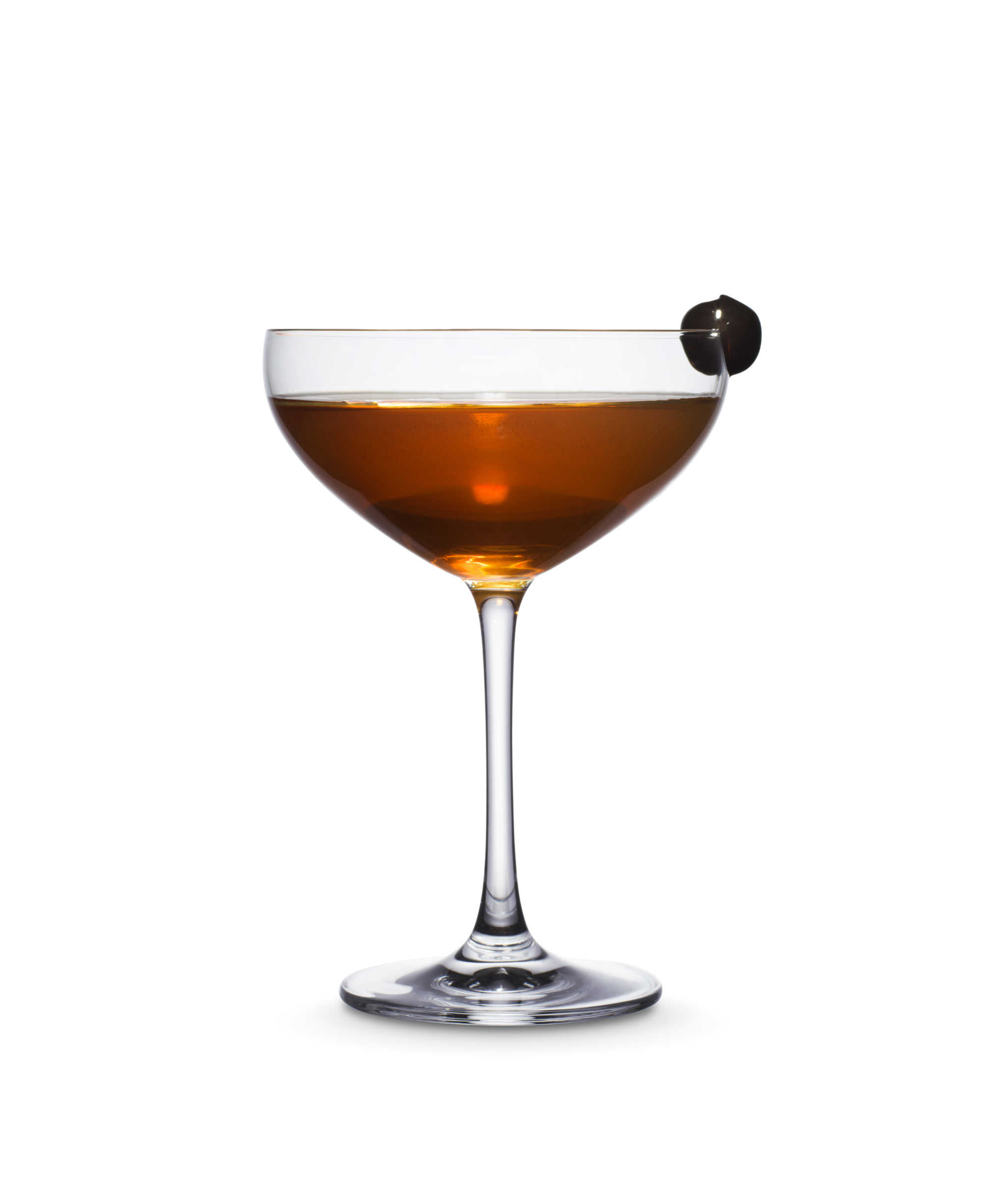 Classic Manhattan cocktail in a martini glass. Made using Kyrö Malt rye whisky and garnished with Maraschino cherry.