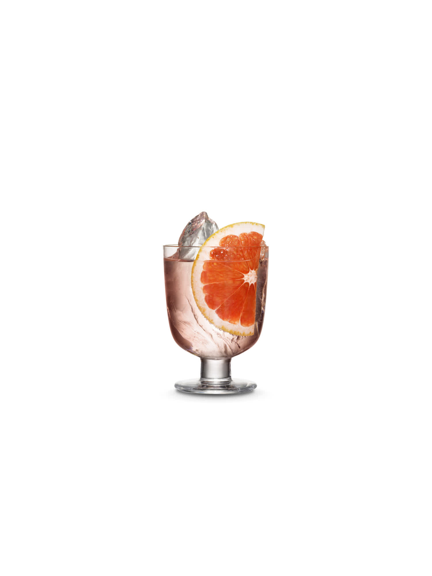 Kyrö Pink Gin & Tonic perfect serve in an Iittala cocktail glass, hand-cut shards of ice, and a slice of blood orange. Photo by KoskiSyväri.