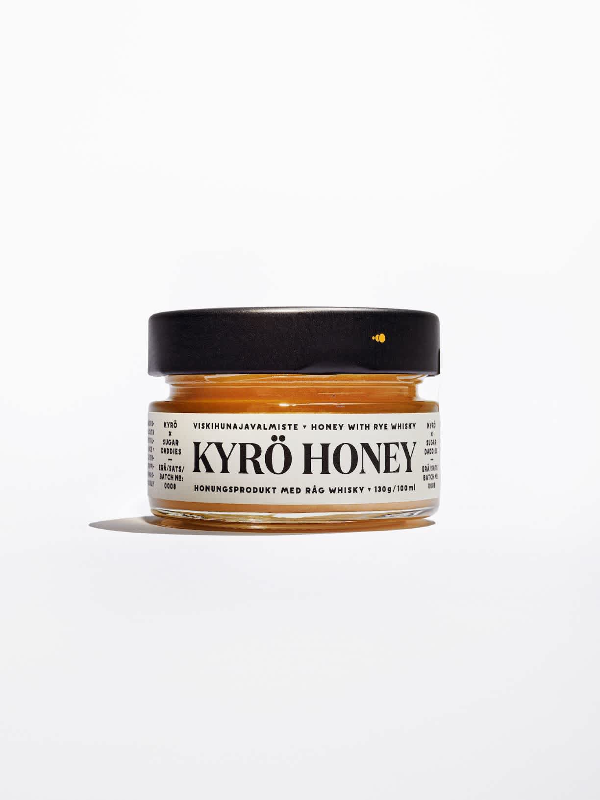 Product photo: a clear disc-like jar filled with honey. Produced by the Kyrö Distillery Company in Isokyrö, Finland. 