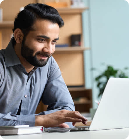 SaaS - Man checking laptop