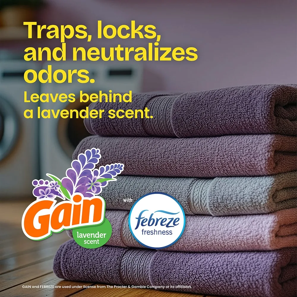 The words "Traps, locks and neutralizes odors. Leaves behind a lavender scent. Gain Lavender" and a febreze freshness logo over a laundry room and towels background