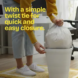 A person taking a trash bag out of a small trash can. The words "With a simple twist tie for quick and easy closure" printed in yellow