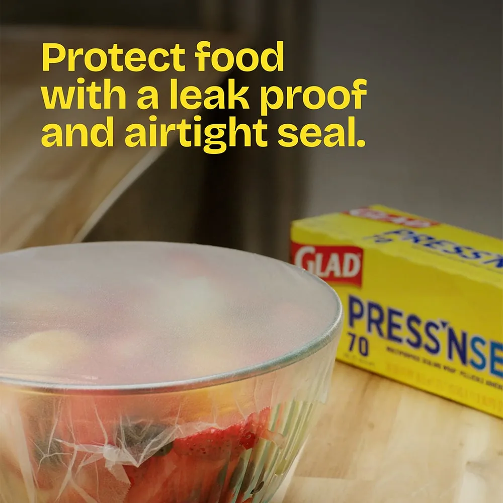 A glass bowl of food with Press'n Seal over the top. The words "Protect food with a leakproof and airtight seal"