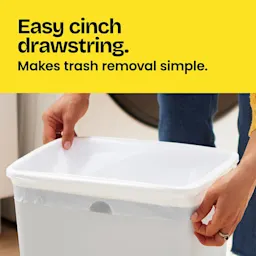 Hands putting a bag in a medium trash can. A blue panel with the words "Easy cinch drawstring. Makes trash removal simple."