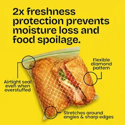 A sandwich in a zippered bag with claims highlighted. The words "2X freshness protection prevents moisture loss & food spoilage" above in yellow.