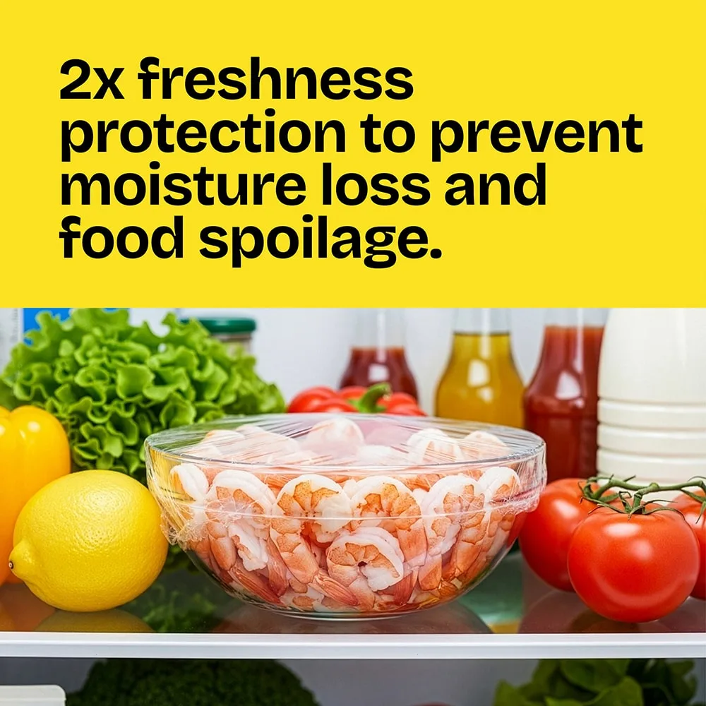 A glass bowl of shrimp covered with Cling'n Seal on a refrigerator shelf. The words "2X freshness protection prevents moisture loss & food spoilage"