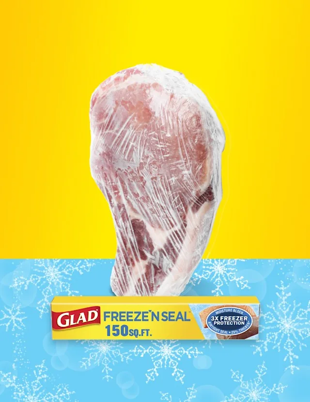 Frozen chicken wrapped in Freeze'N Seal with a yellow and blue background. A box of Freeze'N Seal sits in front.
