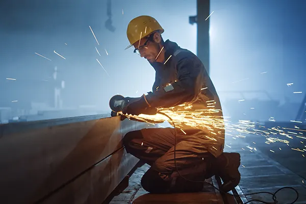 Man-Indoors-YellowHat-Soldering THUMBImage