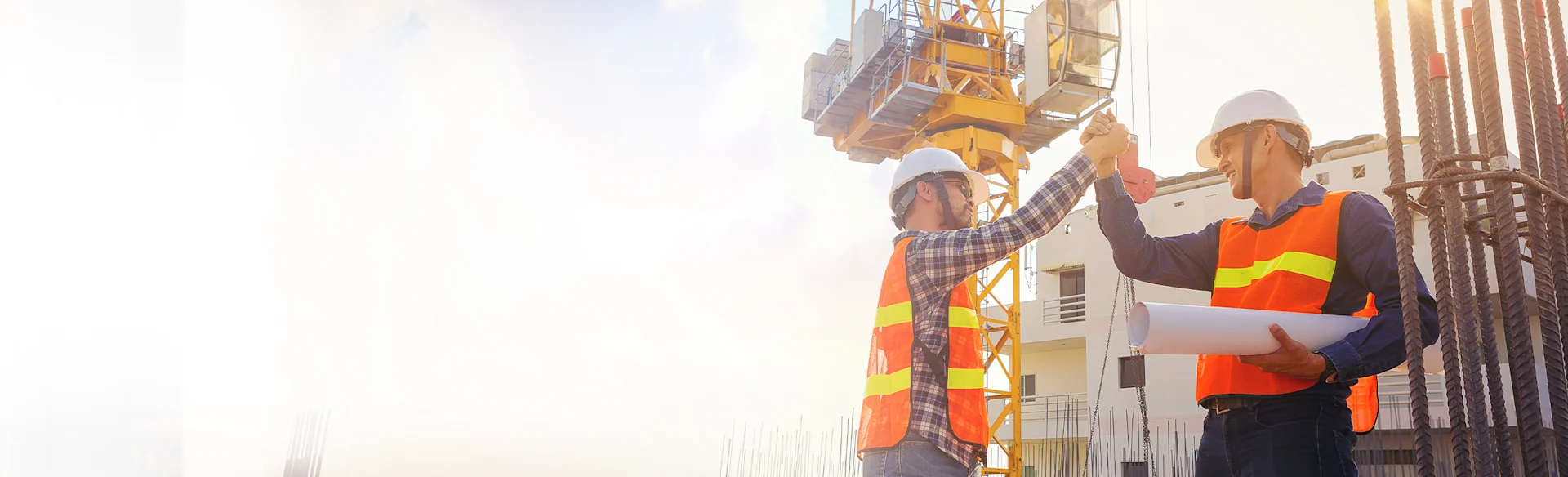 Architect-engineer-construction-workers-shaking-hands HEROImage
