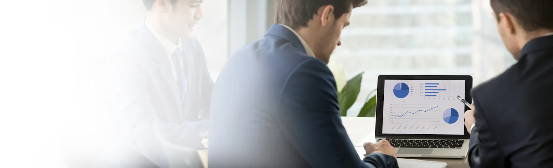 Accountants looking at financial charts HERO 1200x800
