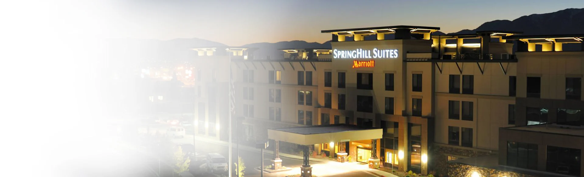 Exterior hotel shot at night 1200x480