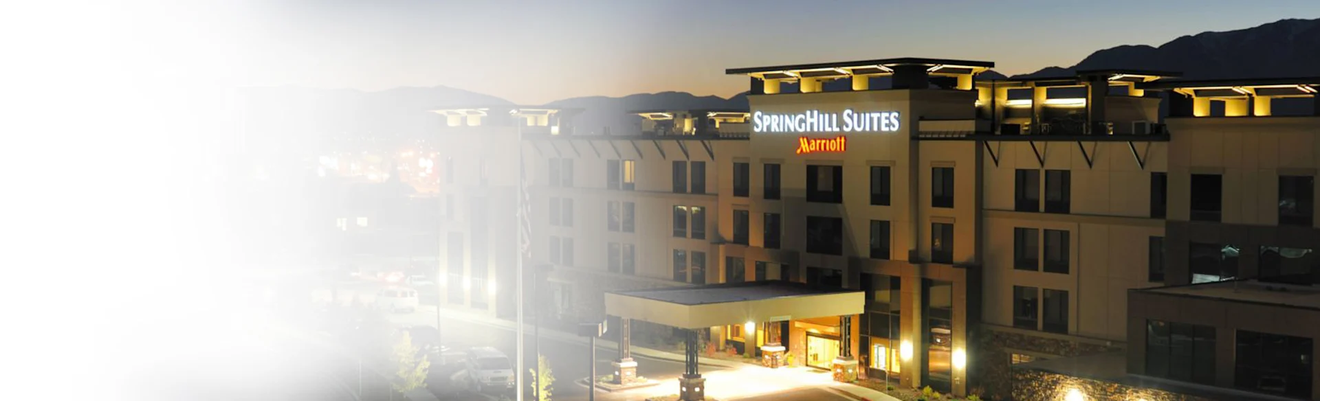Exterior hotel shot at night 1200x480