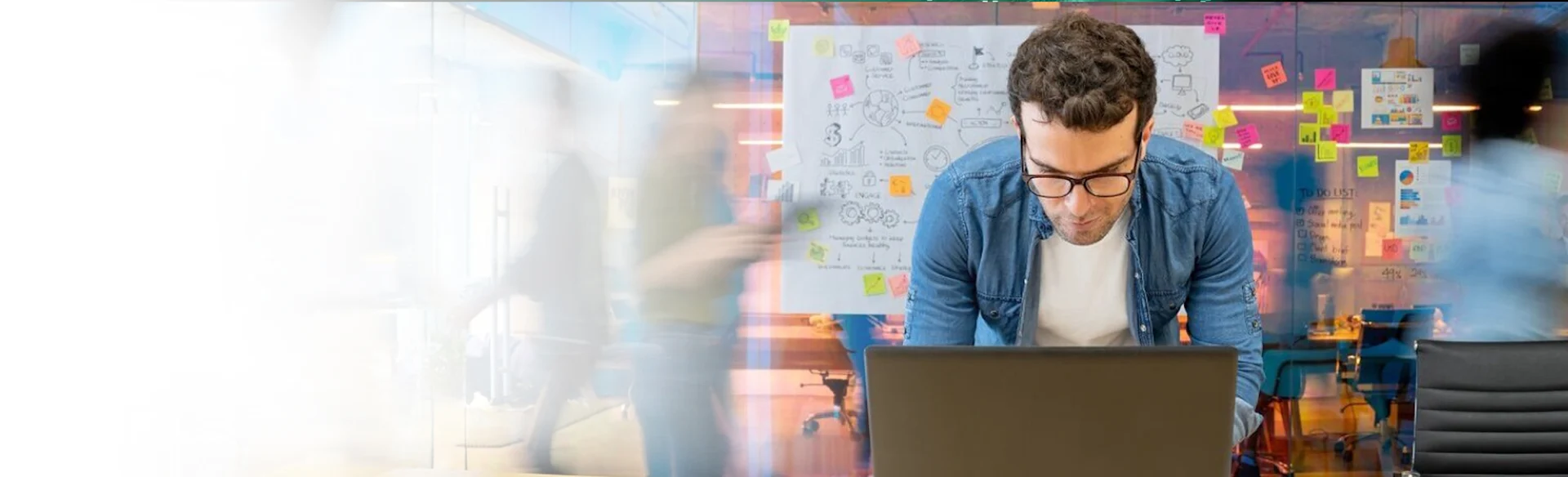 Male employee look at his monitor