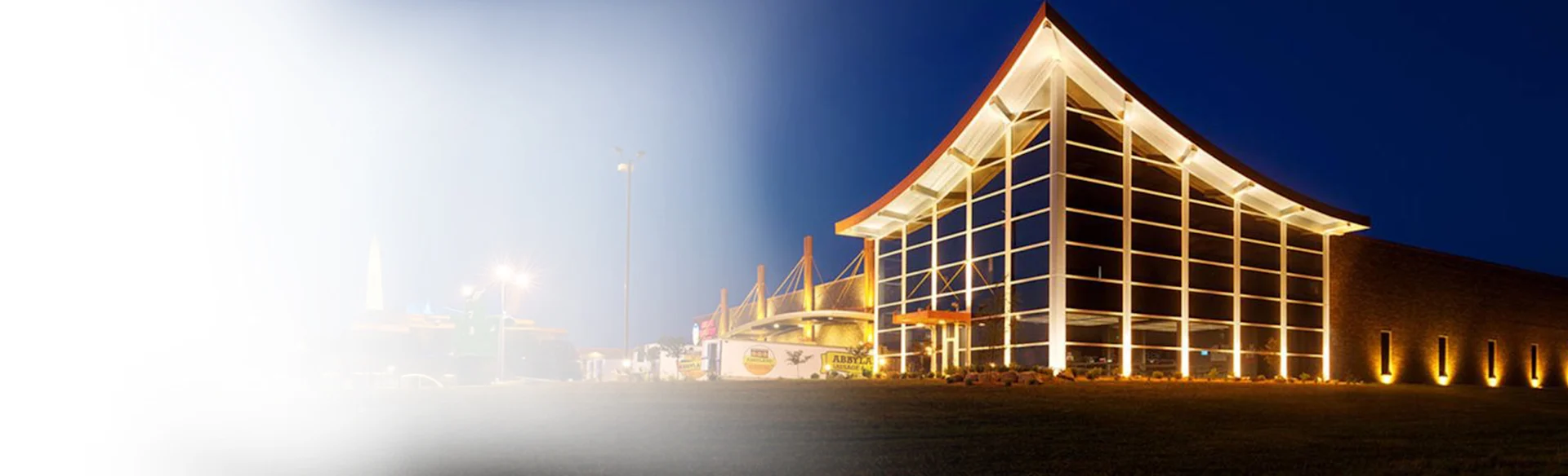 Miron Hero 1200x480 - View of building at night