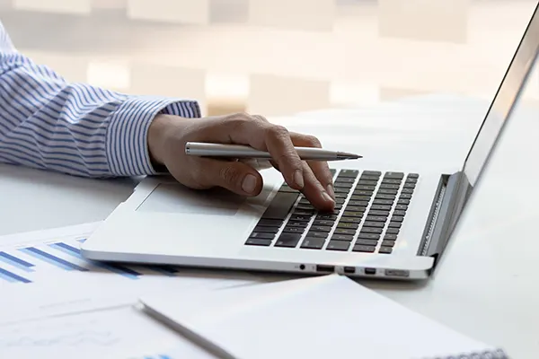 businessman-typing-working-laptop-finance