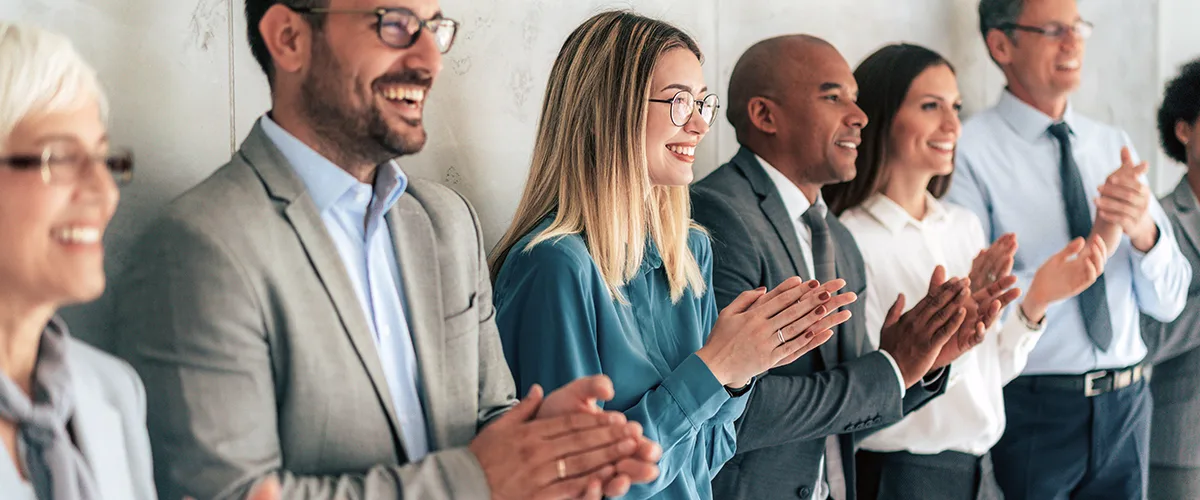 employees clapping their hands