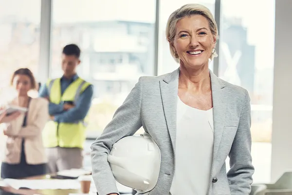 ConstructionLady-WhiteHelmet-Smiling THUMBImage