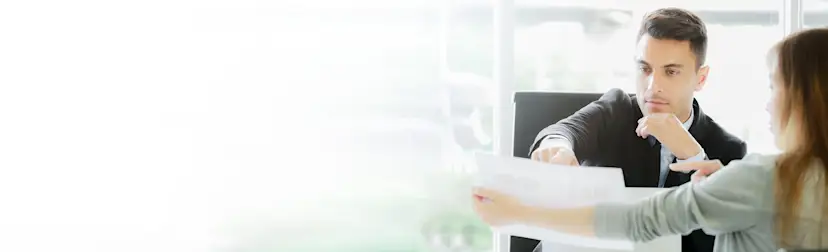 Man-Woman-DeskTop-Pointing HEROImage