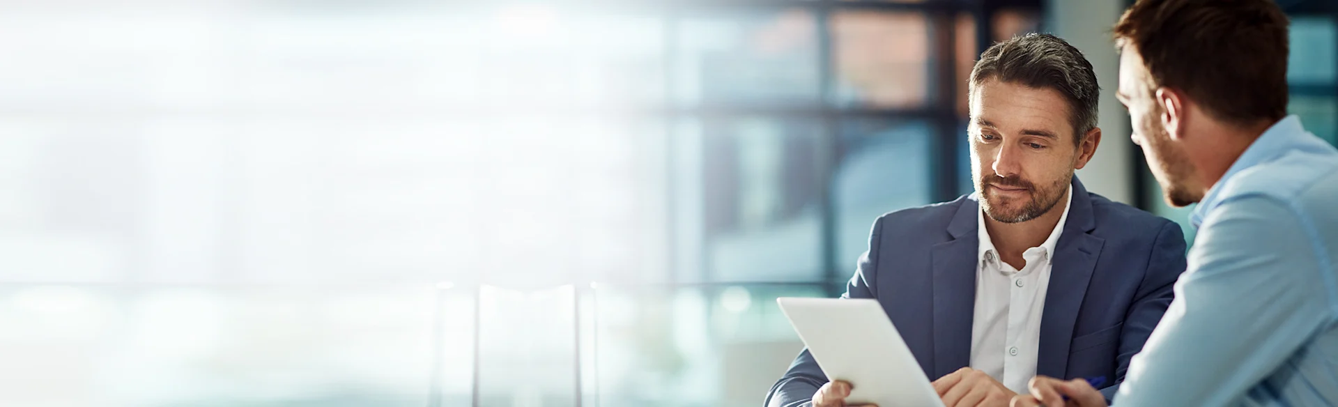 TwoMen-Laptop-Formal-ChangeManagement HEROImage