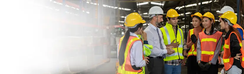 Seven construction workers talking