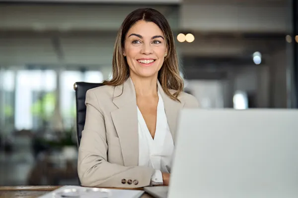 SingleWoman-Laptop-Formal-Smiling THUMBImage