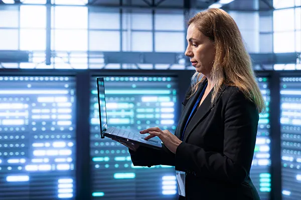 Woman-Indoors-Laptop-Tech THUMBImage