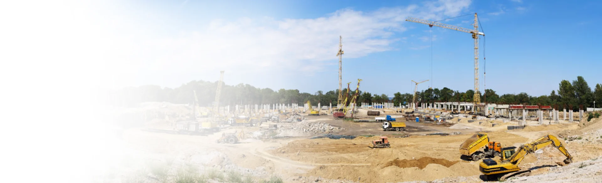 Cranes at a construction site 1200x388