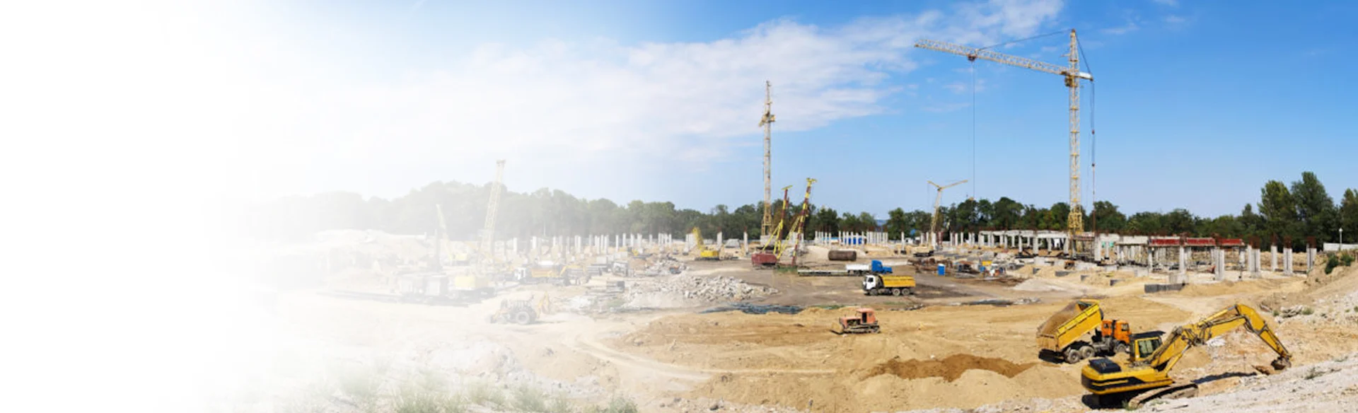 Cranes at a construction site 1200x388