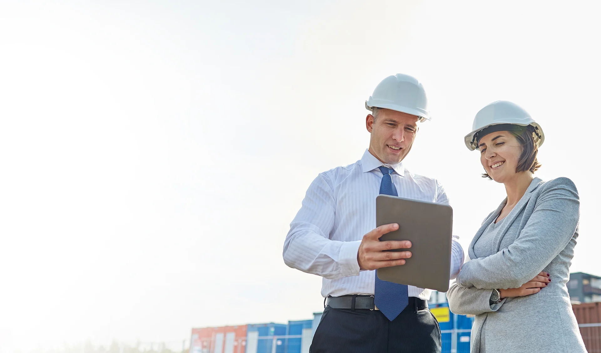 Two construction executives looking at an iPad