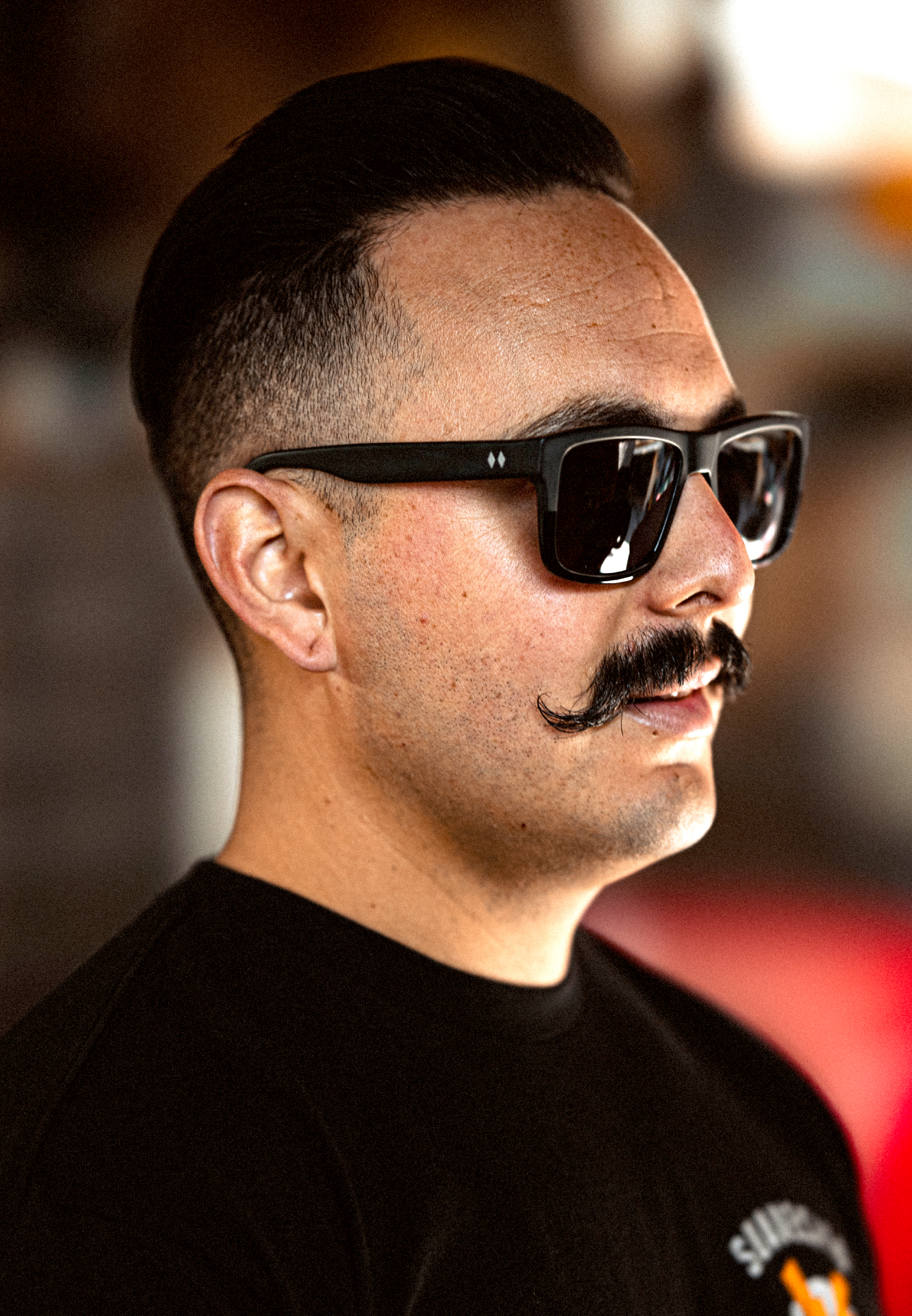Man wearing black Primo sunglasses