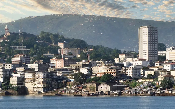 A city on the shore of a body of water.